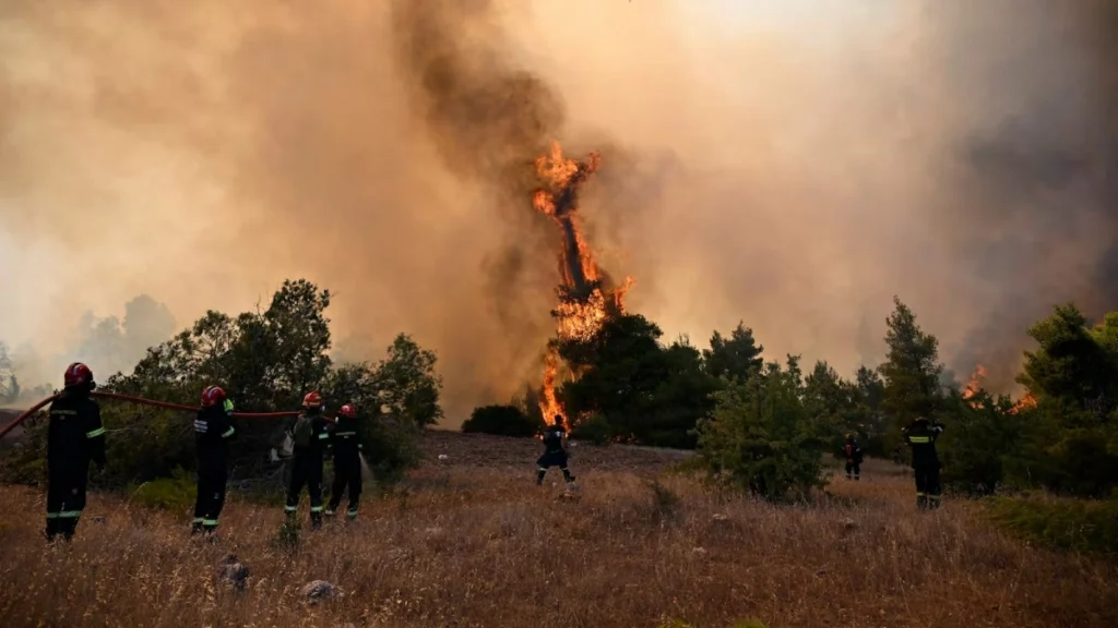 Two helicopters collide while battling wildfire in Greece